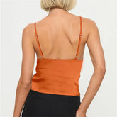 Orange tank top worn by a person-back